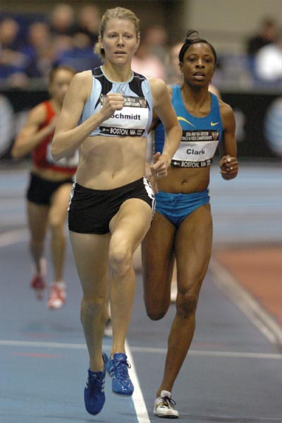 Alice Schmidt and Hazel Clark pull ahead with one lap to go.