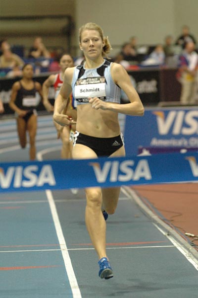 Alice Schmidt increased her lead on the final lap and broke the tape in 2:01.93.