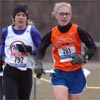 Sue Pearsall of the Central Park Track Club leads Sheri Wright of Fleet Feet Boulder.