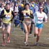 Approaching the 2K mark, (L-R) Katie McGregor, Blake Russell, and Colleen De Reuck run together up front.