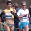 Approaching the halfway point of the 8K race, Blake Russell (left) and Colleen De Reuck had separated themselves from the rest of the field.