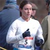 Renee Metivier of Boulder, Colorado, runs in fifth place around the halfway point.