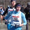 Nicole Aish leads Kara Goucher. Both Aish and Goucher are married to professional runners. Kara's husband Adam won the men's 4K the previous day.