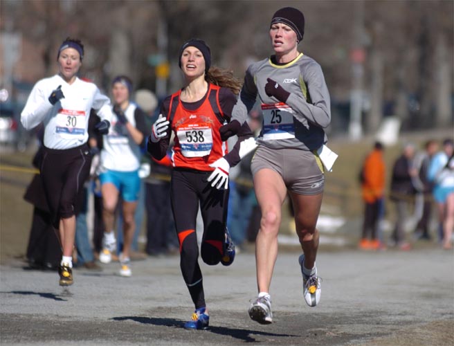 Bei ran with Lauren Fleshman until the homestretch, when she began to fade. She held on to finish sixth (12:51) and make the team. She will join her husband, Ryan, in Fukuoka.